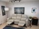 Jackston Leather Power Sofa
